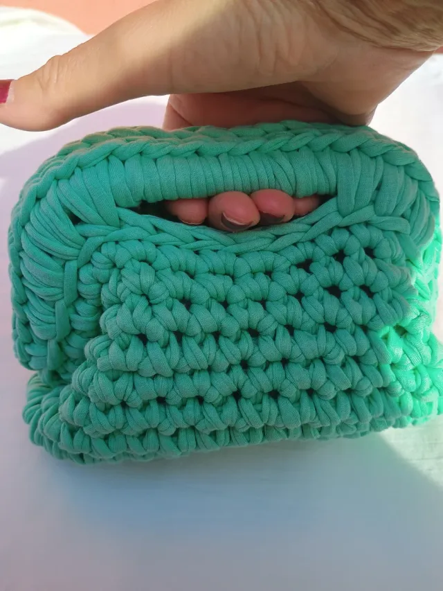 Miniclucth  con chiusura a molla