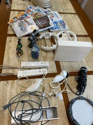 Consola Wii con mandos y juegos