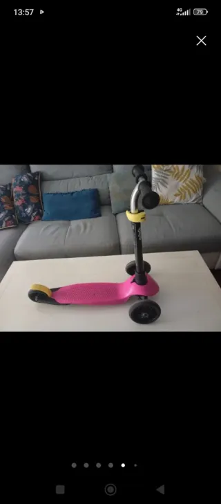 Bicicleta infantil rosa con ruedines