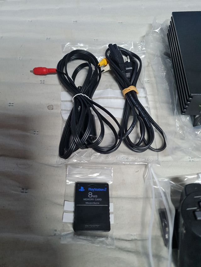 Console PS2 nera + 3 controller + 15 giochi