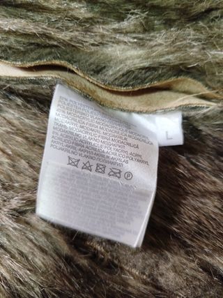 Chaleco pelo sintético beige y gris