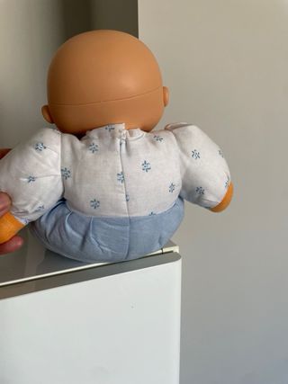 Muñeco de trapo bebé con mameluco azul