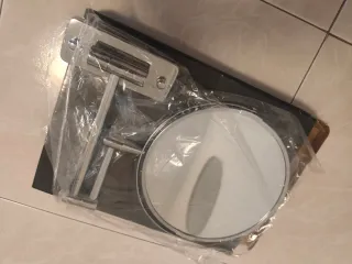 Espejo de pared plateado
