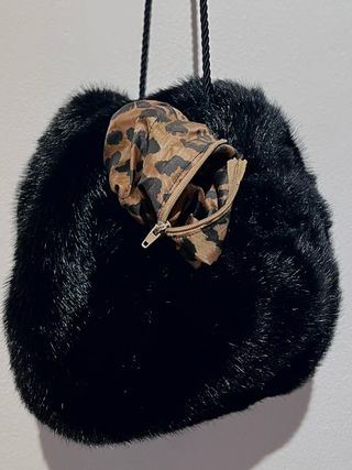 Manicotto finto visone con tasca