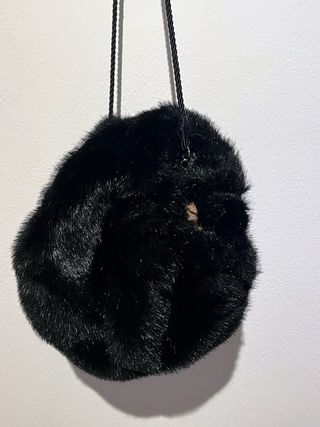 Manicotto finto visone con tasca