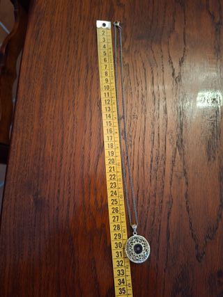 collana in acciaio colore argento con pietra viola