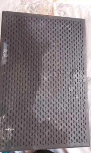 Placa metálica perforada