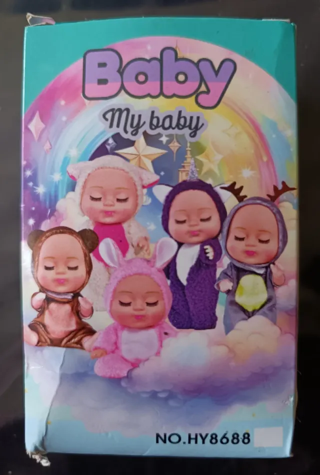 Muñeca bebé con pijama de oveja