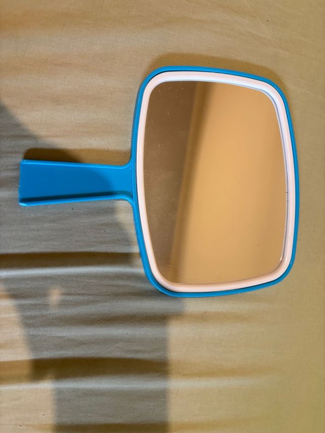 Espejo de mano azul y blanco