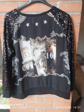 Maglia donna manica lunga nera con paillettes