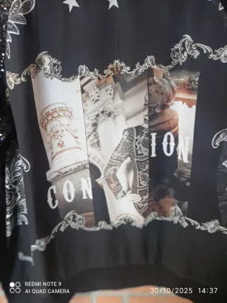 Maglia donna manica lunga nera con paillettes