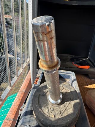 5 discos de 1kg y mancuerna