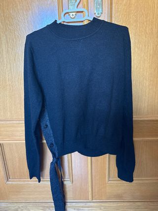 Jersey negro con detalle plateado