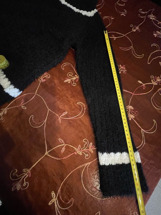 Maglione nero e bianco