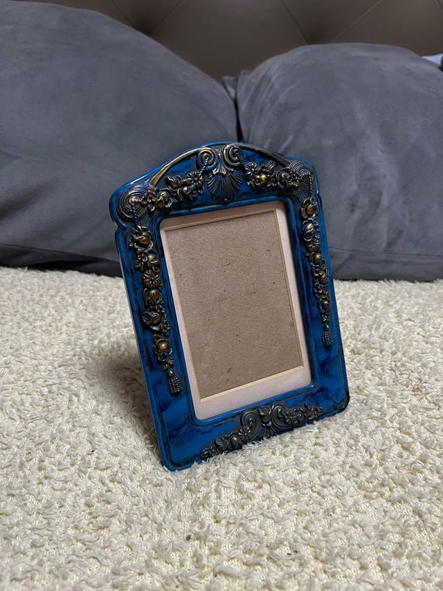 Marco de fotos azul y dorado