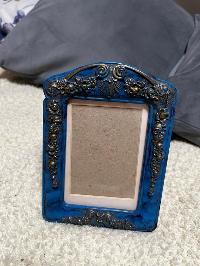 Marco de fotos azul y dorado