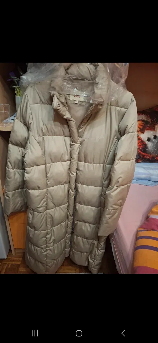 Giacca donna beige lunga imbottita
taglia  L