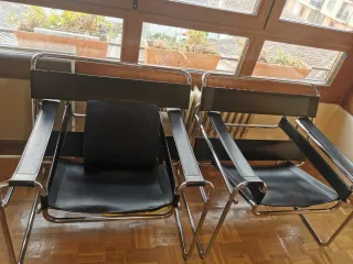 Poltrone Wassily in pelle e metallo