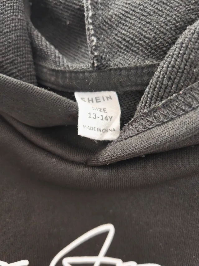 Sudadera Shein negra, con capucha.Los Ángeles. Tal