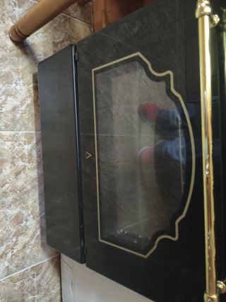 Cocina de gas negra con horno