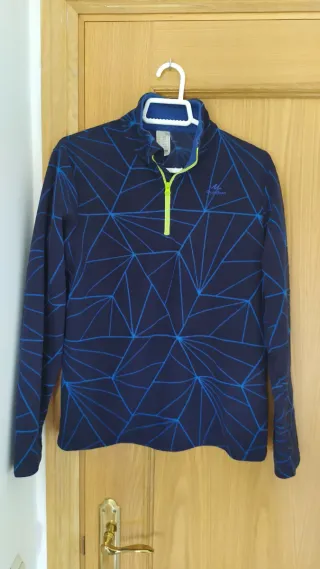 Polar Quechua niño azul geométrico