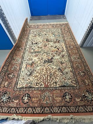 Alfombra de lana beige y naranja