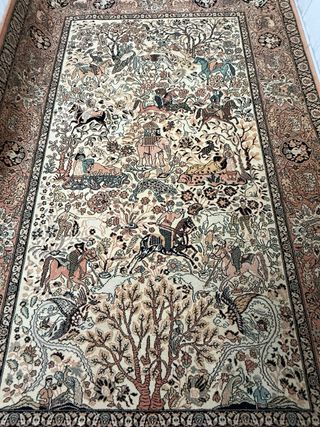 Alfombra de lana beige y naranja