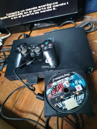 Consola PlayStation 2 con mando y juego