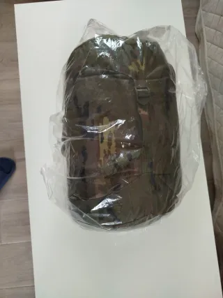 Saco de dormir pixelado boscoso