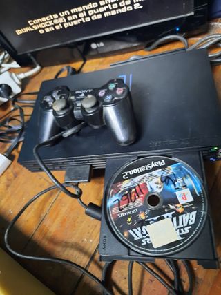 Consola PlayStation 2 con mando y juego