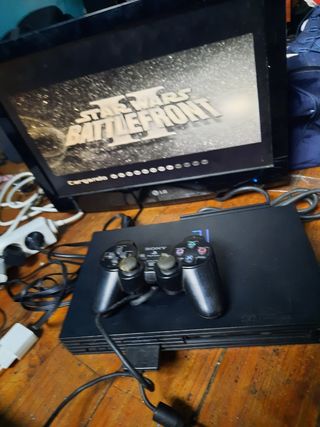 Consola PlayStation 2 con mando y juego