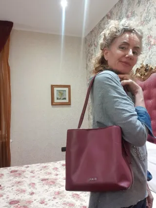 Borsa Tous pelle bordeaux piccolo difetto sotto