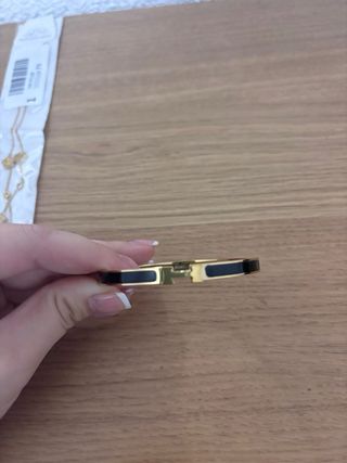 Pulsera H Dorada y Blanca