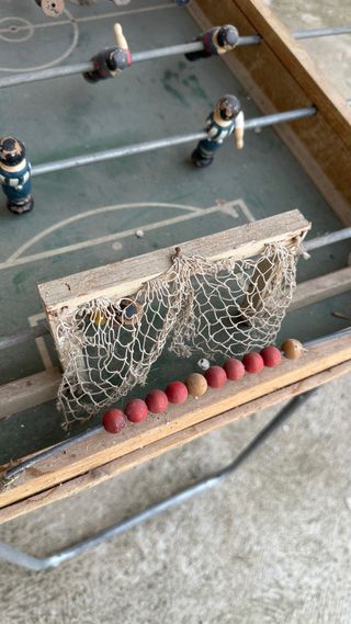 Futbolín antiguo plegable
