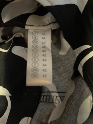 Falda estampada blanco y negro con cinturón y otra