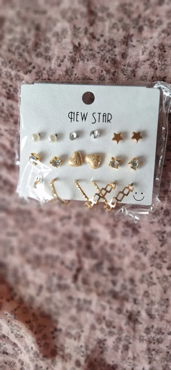 Conjunto de pendientes dorados New Star
