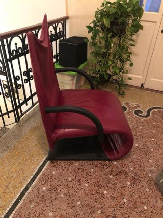 Elegante poltrona bordeaux in vera pelle