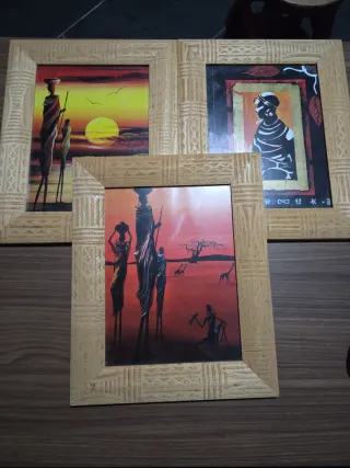 Cornici in legno con quadri africani