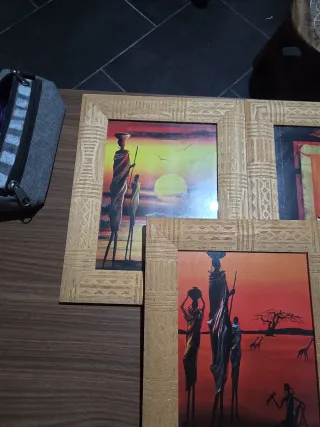 Cornici in legno con quadri africani