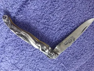 Navaja antigua con figura femenina De plata