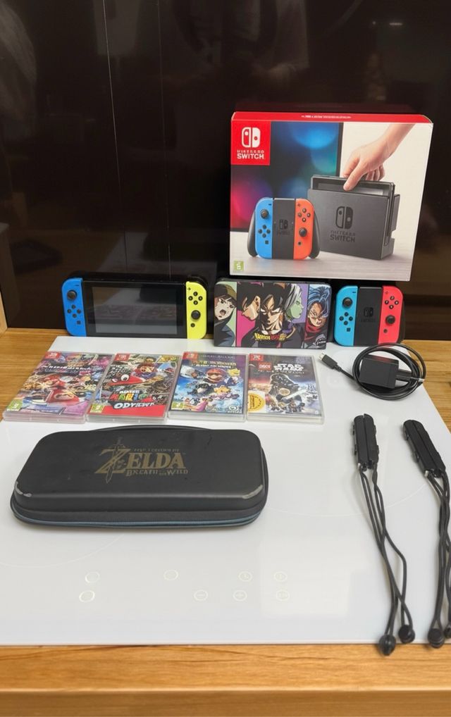 Nintendo Switch + Funda Zelda + 2 Joy Con + Juegos