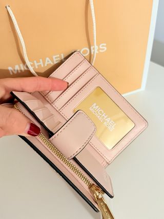 Portafoglio Michael Kors rosa con disegni