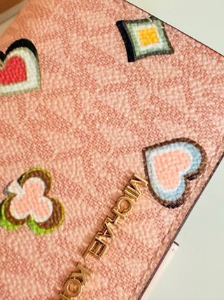 Portafoglio Michael Kors rosa con disegni
