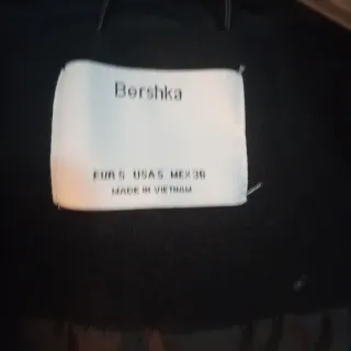 Cazadora de Plumas Amarilla y Negra