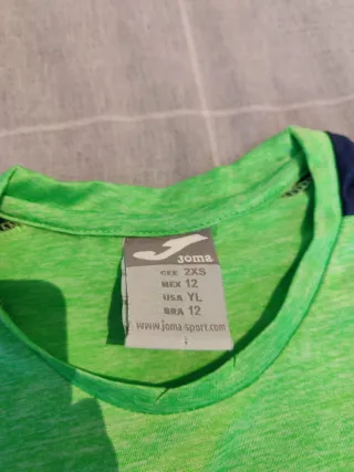 Conjunto deportivo Joma verde y azul