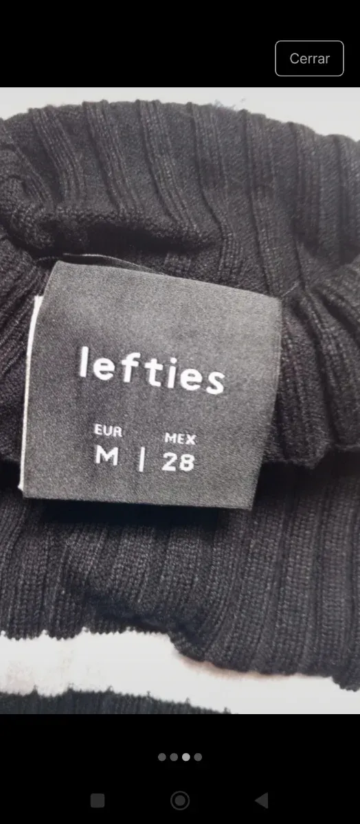 Maglione a collo alto a righe Lefties