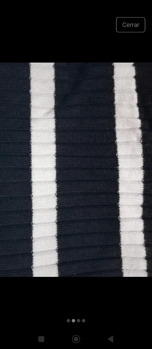 Maglione a collo alto a righe Lefties