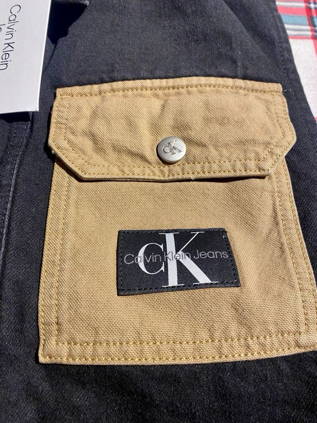 Chaleco Calvin Klein Jeans Negro y Mostaza