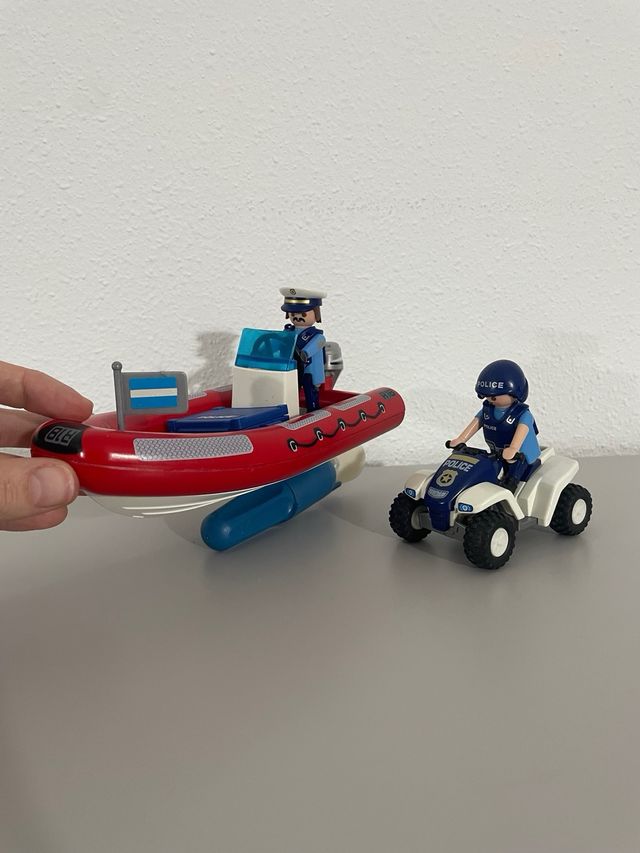 Barca della polizia Playmobil con quad