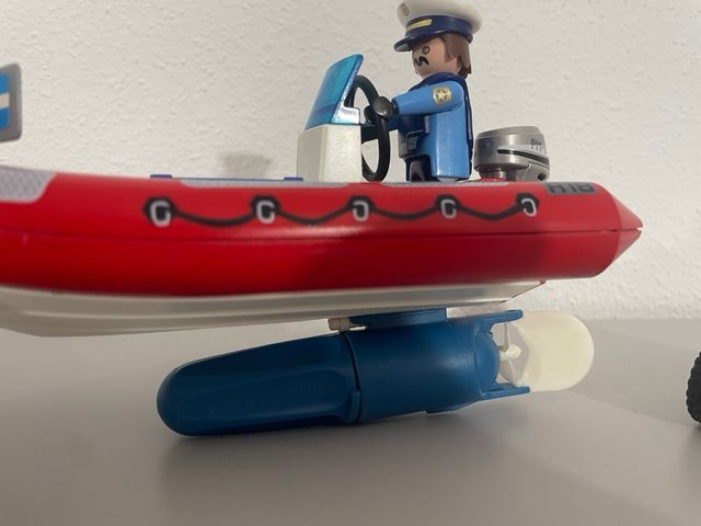 Barca della polizia Playmobil con quad